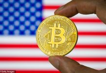 Bitcoin surges to a new record high on rate cut hopes before easing back