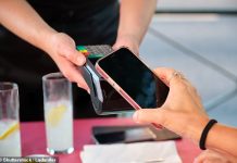 Cash usage shrinks to below 10% for first time on record as Britons turn to mobile phones to make payments