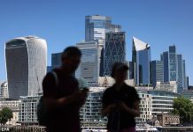 Footsie hits record high: Index clocks up best summer since 2016 despite renewed fears for the economy