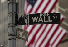 Tech stocks tumble amid fears of an AI bubble and sticky interest rates